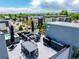 Relax on this amazing rooftop deck with mountain views, stylish seating, and a hot tub at 4950 Lowell Blvd, Denver, CO 80221