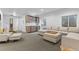 Spacious basement with a wet bar and comfortable lounge area at 2107 S Grant St, Denver, CO 80210