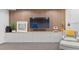 Modern basement design with custom wood accent wall and entertainment center at 2107 S Grant St, Denver, CO 80210