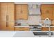 Well-appointed kitchen boasting custom cabinets, white countertops, and stainless steel appliances at 2107 S Grant St, Denver, CO 80210