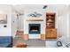 Cozy living room with a modern fireplace, decorative mantel, and stylish accents at 2107 S Grant St, Denver, CO 80210