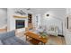 Stylish living room with modern fireplace, built-in shelves, and comfortable seating at 2107 S Grant St, Denver, CO 80210