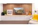 Basement living room with a large TV and a modern wood slat media wall at 2107 S Grant St, Denver, CO 80210