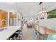 Spacious open floorplan with a kitchen, dining area, and living room at 2107 S Grant St, Denver, CO 80210