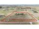 Real estate aerial showing property lines are approximate and not a survey at 575 Heritage Trl, Elizabeth, CO 80107