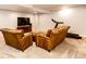 Finished basement featuring comfortable seating and a carpeted floor at 575 Heritage Trl, Elizabeth, CO 80107