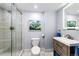 Modern bathroom with a glass-enclosed shower and sleek vanity at 575 Heritage Trl, Elizabeth, CO 80107