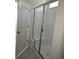 Bathroom featuring a walk-in shower with glass door at 6066 Caribou Dr, Brighton, CO 80601