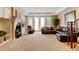 Finished basement area with a fireplace, media area, and walkout access to the backyard at 9298 Spirit Ct, Parker, CO 80138
