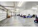 Spacious garage features high ceilings, multiple garage doors, and ample storage space at 9298 Spirit Ct, Parker, CO 80138