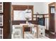 Inviting dining room featuring a wooden table, stylish seating, and elegant decor, perfect for Gathering gatherings at 1620 Dahlia St, Denver, CO 80220