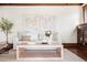 Bright living room featuring hardwood floors, stylish decor, and comfortable seating at 1620 Dahlia St, Denver, CO 80220
