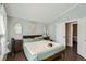 Bedroom boasts soothing paint, trim, and stylish decorations at 13294 W 65Th Dr, Arvada, CO 80004