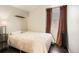 This bedroom is cozy and bright at 13294 W 65Th Dr, Arvada, CO 80004
