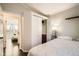 Cozy bedroom features a closet, neutral walls, and a comfortable bed with soft bedding at 13294 W 65Th Dr, Arvada, CO 80004