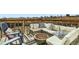 Relaxing outdoor deck with comfortable seating, a fire pit, and scenic views at 10610 Moore Ct, Westminster, CO 80021