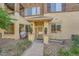 Charming condo entrance with well-kept landscaping, a covered porch, and stylish exterior at 803 E 98Th Ave # 105, Thornton, CO 80229