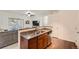 Stylish kitchen with granite countertops, stainless steel appliances, and open layout to the living room at 803 E 98Th Ave # 105, Thornton, CO 80229