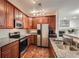 Modern kitchen with stainless steel appliances, granite countertops, and plenty of cabinet space at 803 E 98Th Ave # 105, Thornton, CO 80229