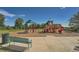Outdoor playground with swings, slides, and climbing structure offers recreational opportunities at 803 E 98Th Ave # 105, Thornton, CO 80229