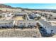 Private backyards with cozy patios, and fencing, creating ideal outdoor spaces for relaxation and enjoyment at 114 Vale St, Palmer Lake, CO 80133