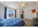 Bedroom with carpet, closet, and a bright window that provides natural light at 114 Vale St, Palmer Lake, CO 80133