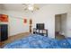Bedroom with carpet, TV on shelving, and access to ensuite bathroom at 114 Vale St, Palmer Lake, CO 80133