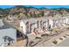 Beautiful townhomes boasting attached garages, well-maintained exteriors, and picturesque mountain views for a serene living environment at 114 Vale St, Palmer Lake, CO 80133