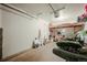 Organized garage with lofted storage space and ample room for parking and projects at 114 Vale St, Palmer Lake, CO 80133