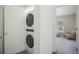 A convenient stackable washer and dryer are conveniently situated near the bedroom at 114 Vale St, Palmer Lake, CO 80133