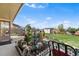 Backyard with patio, lawn, fountain, shed, and other backyard features at 3191 S Holly Pl, Denver, CO 80222