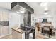Bright, open kitchen with a stove at 3191 S Holly Pl, Denver, CO 80222
