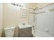 Bathroom featuring gray vanity, white tiled shower, and chrome fixtures offer a modern and functional space at 8039 Wolff St # E, Westminster, CO 80031