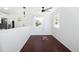 Bright dining area with modern fixtures, lots of light, and dark-wood flooring at 1455 W Alaska Pl, Denver, CO 80223