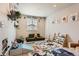 Bright playroom with colorful rug, plush seating, and engaging decorations for imaginative fun at 12815 Randles Ave, Parker, CO 80134