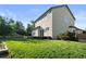 Large, verdant backyard featuring a well-maintained lawn and a spacious wooden deck at 3232 Cimarron Pl, Superior, CO 80027