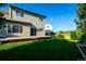 Green backyard with a deck, great for relaxing or entertaining guests at 3232 Cimarron Pl, Superior, CO 80027