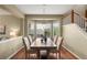 Elegant dining room with a large bay window and stylish hardwood flooring at 3232 Cimarron Pl, Superior, CO 80027