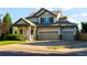 Charming two-story home with a well-maintained front yard and three car garage at 3232 Cimarron Pl, Superior, CO 80027