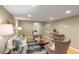 Bright living room with hardwood floors, comfortable seating, and a view through the doorway at 3232 Cimarron Pl, Superior, CO 80027