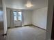 Bedroom with carpet and two windows at 11323 E Cimmarron Dr, Englewood, CO 80111