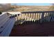 Cozy wood deck with painted railing, bench, and scenic outdoor view at 11323 E Cimmarron Dr, Englewood, CO 80111