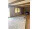 This bright living room offers a fireplace, built-in shelves, and lots of space at 11323 E Cimmarron Dr, Englewood, CO 80111