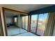 Bright room with mirrored closet and slider to deck at 11323 E Cimmarron Dr, Englewood, CO 80111
