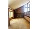 Spacious living room featuring a vaulted ceiling, large brick fireplace and ample natural light at 11323 E Cimmarron Dr, Englewood, CO 80111