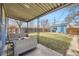 Inviting backyard patio featuring comfortable seating, perfect for outdoor relaxation and entertaining at 1701 W 50Th Ave, Denver, CO 80221