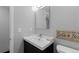 Cozy bathroom featuring updated vanity, toilet, and walk-in shower at 1606 Cottonwood Dr # 24S, Louisville, CO 80027