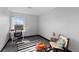 Bedroom featuring neutral walls, desk, and decorative rug at 1606 Cottonwood Dr # 24S, Louisville, CO 80027