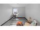 Bedroom featuring neutral walls, desk, and decorative rug at 1606 Cottonwood Dr # 24S, Louisville, CO 80027