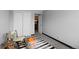 Bedroom featuring neutral walls, closet, and decorative rug at 1606 Cottonwood Dr # 24S, Louisville, CO 80027